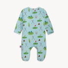 Baby onesie with golf-themed pattern on a light blue background