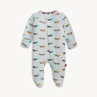 Baby onesie with colorful airplane pattern on a white background