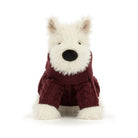 A plush dog toy wearing a burgundy cable-knit sweater, photographed against a seamless white background.