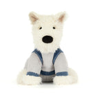 White plush dog toy with a blue sweater on a white background