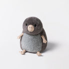 Plush toy penguin on a white background