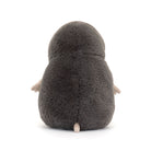 Plush toy penguin from behind on a white background