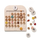 Wooden calendar with detachable months on a white background