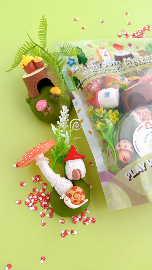 Gnome figurine with a mushroom and a small house on a green background