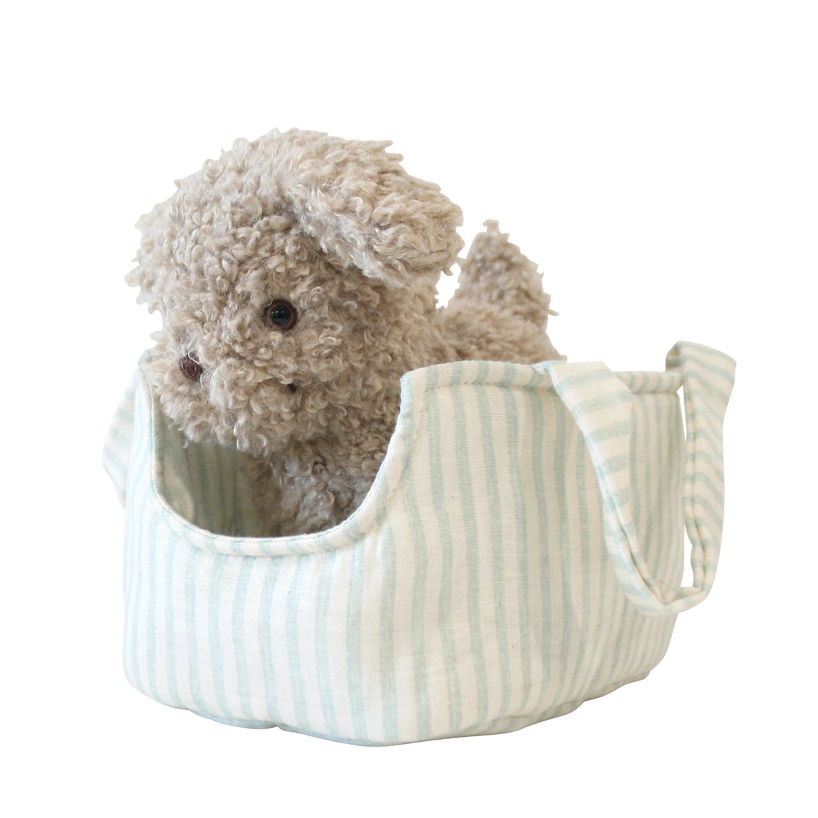 Striped pet carrier with a fluffy toy inside on a white background