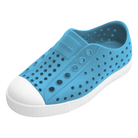 Blue children's shoe with white sole on a white background