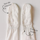 White socks with text highlighting 'Non-slip Grippies!' and 'Comfy Fit Elastic!' on a light gray background.