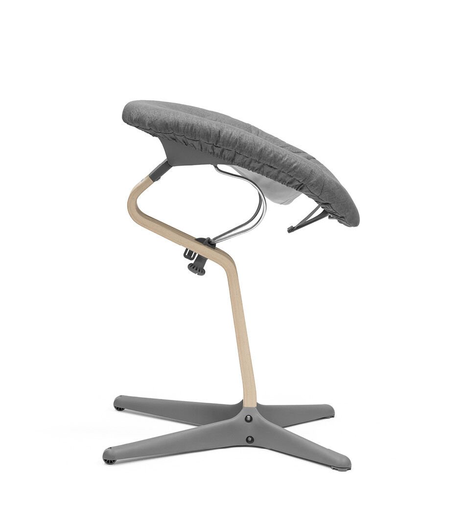 Gray ergonomic chair with a unique design on a white background