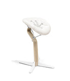 White massage chair with wooden base on a white background