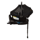 A profile view of a black MIXX Next + Pipa Aire RX Travel System by Nuna infant car seat attached to its base with a load leg, featuring an extended canopy with a mesh window, set against a checkered transparent background.