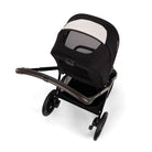 Black baby stroller with mesh canopy on a white background