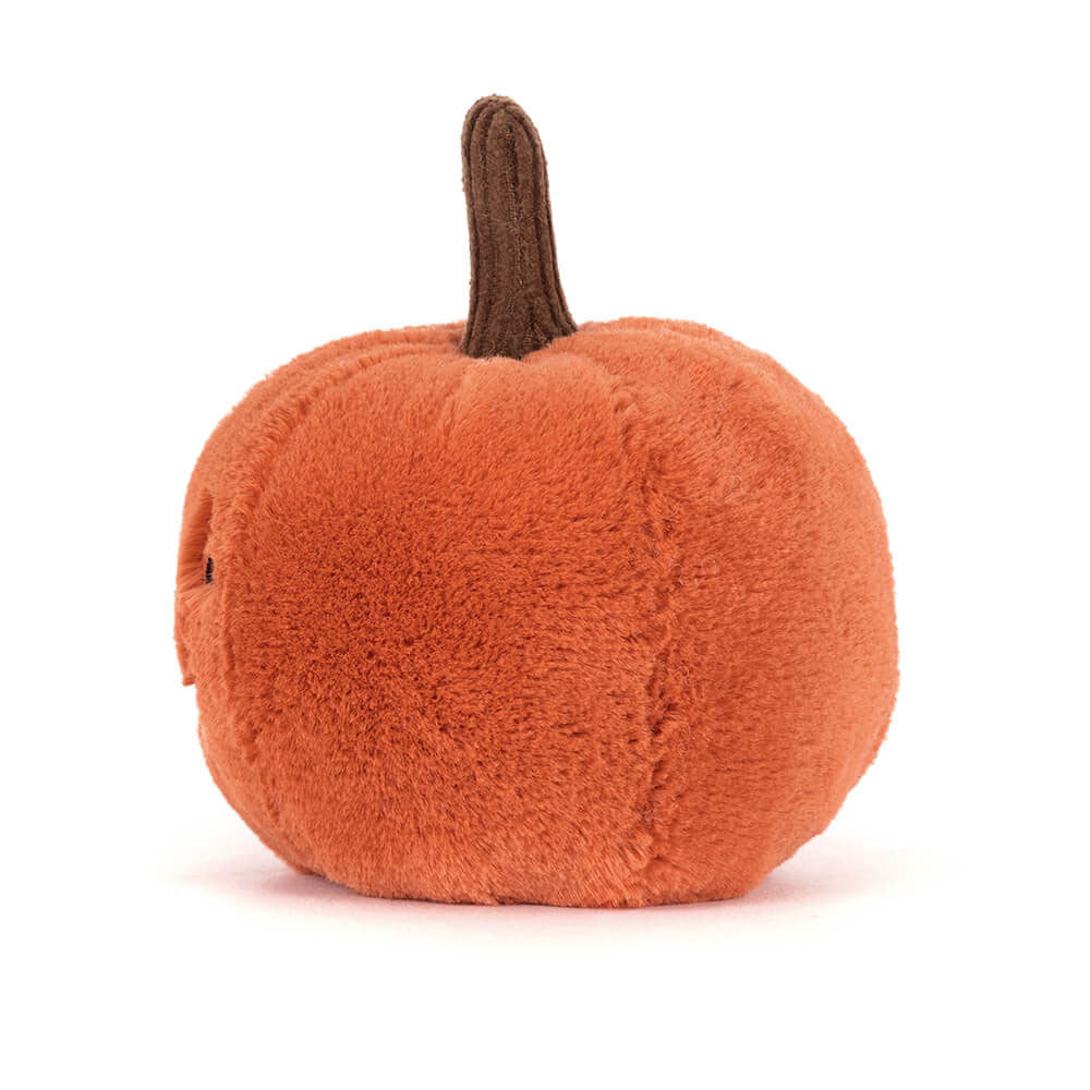 Plush pumpkin toy with a brown stem on a white background