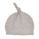 Gray baby hat with a knot on top against a white background