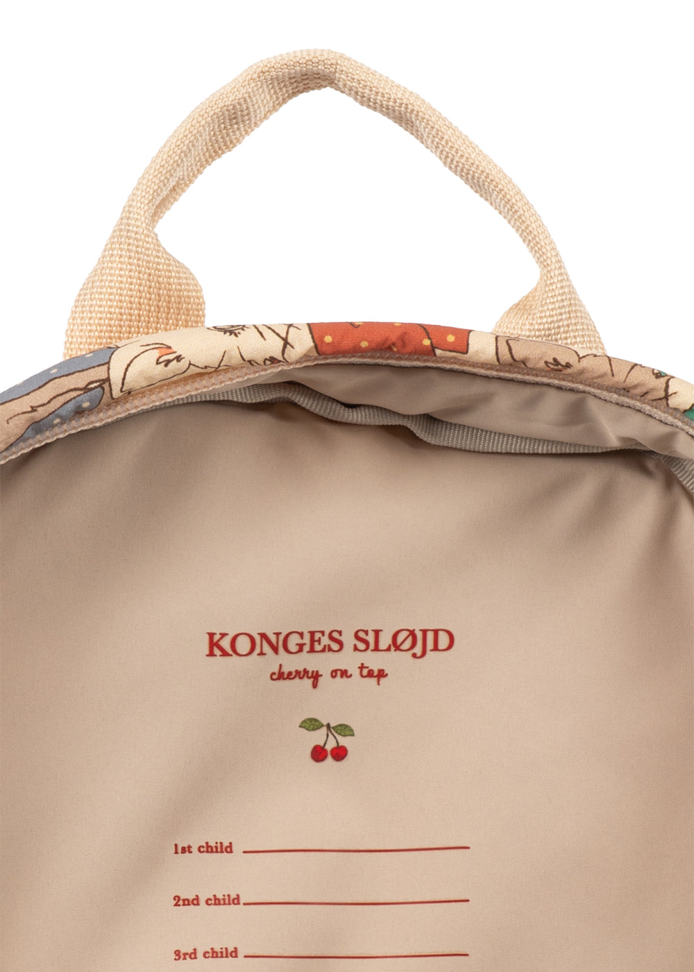 Close-up of a beige fabric bag with woven handles, showing the printed brand name 'KONGES SLOÐ' and a cherry graphic on the front.
