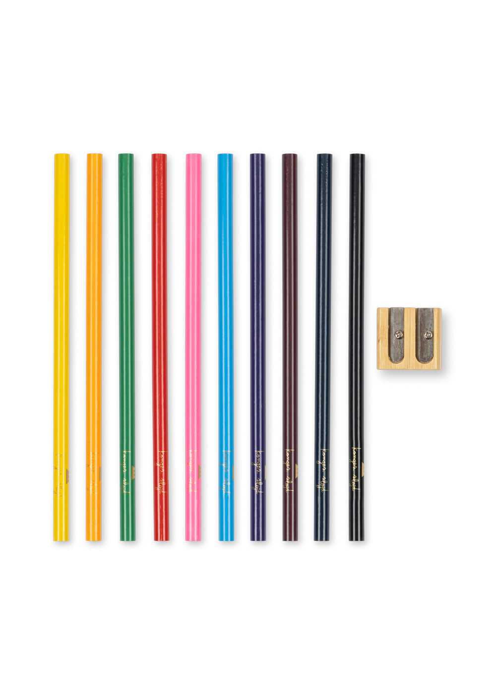 Set of colored pencils and a sharpener on a white background