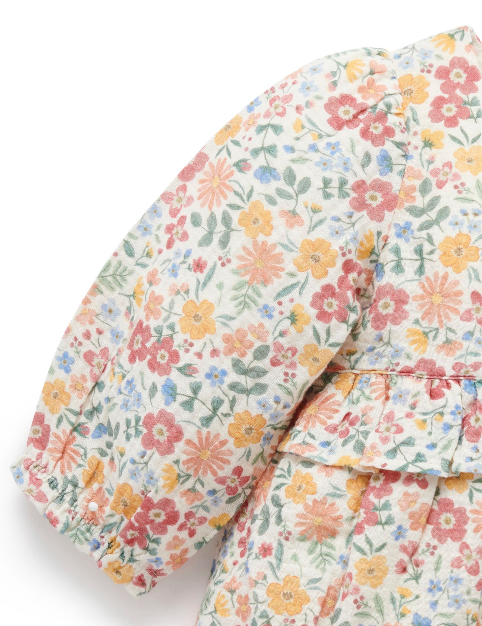 Floral patterned fabric with colorful flowers on a white background