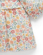 Floral patterned fabric with colorful flowers on a white background