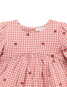 Red and white checkered dress with button details on a white background
