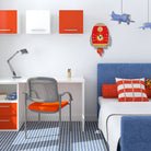 Children's room with desk, chair, and bed with red and blue accents.