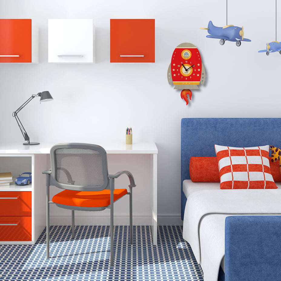 Children's room with desk, chair, and bed with red and blue accents.
