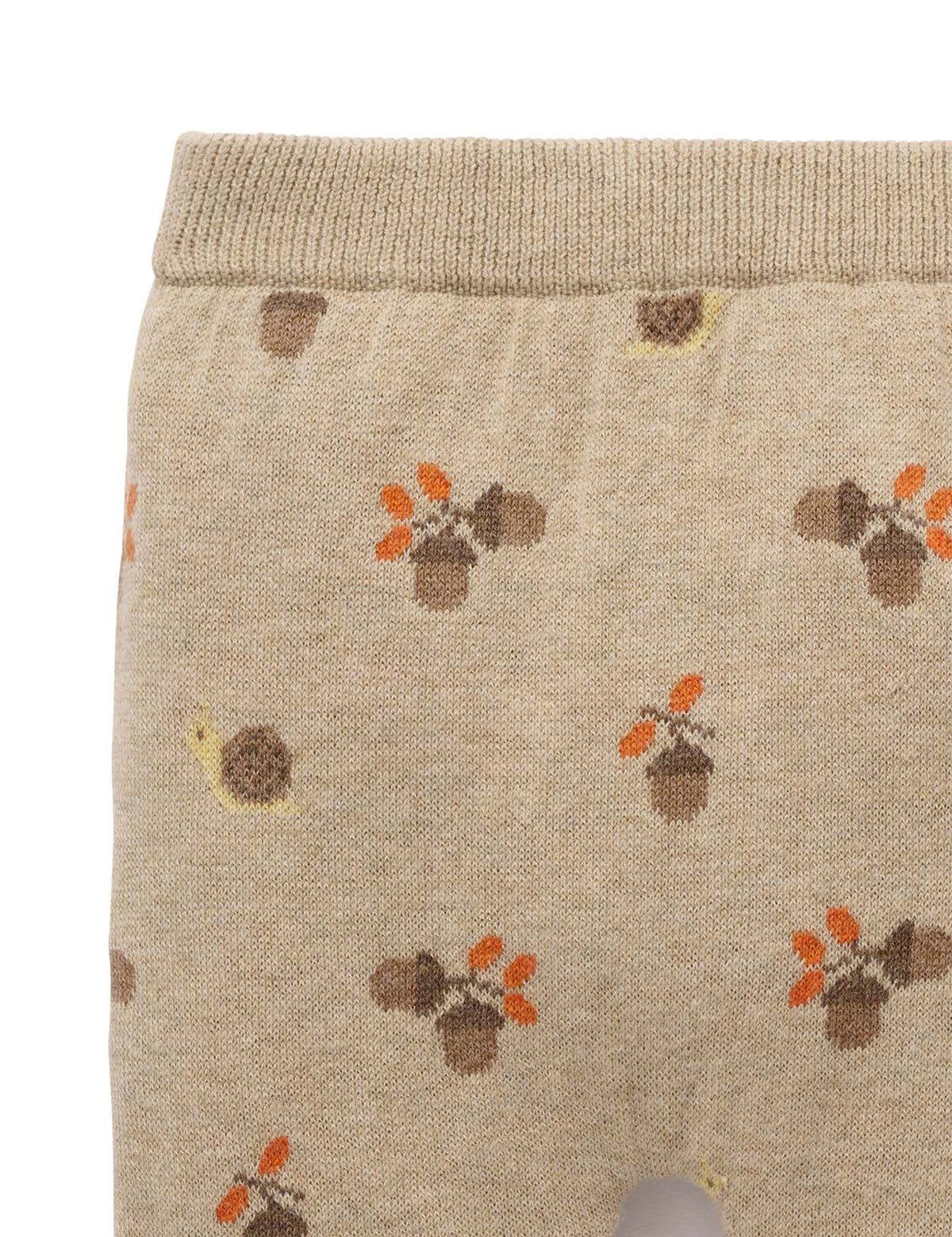 Beige fabric with autumn-themed pattern featuring leaves and acorns on a white background
