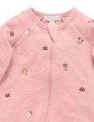 Pink baby jacket with floral embroidery on a white background