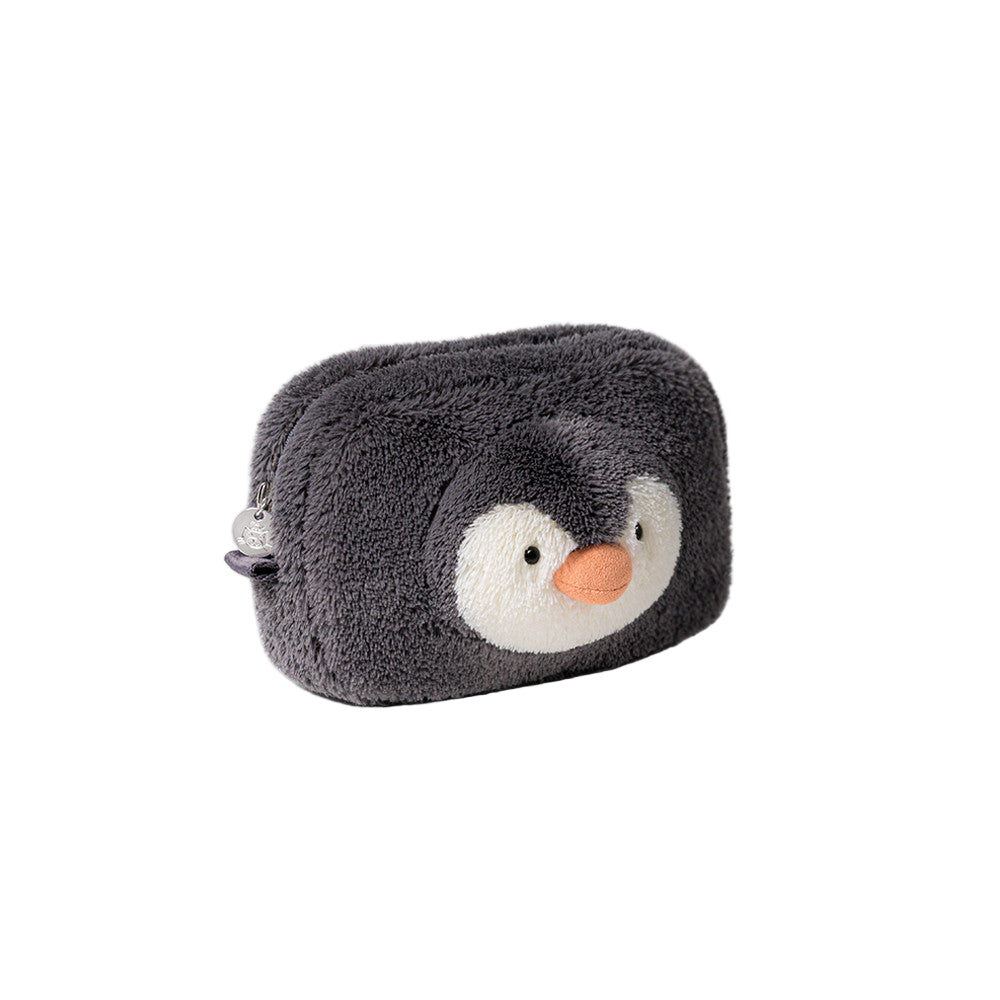 Plush penguin-shaped pouch on a white background