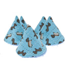 Four triangular fabric dog toys arranged on a white background, featuring a light blue base with a dachshund and squirrel print.