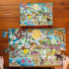 100 Piece Puzzle - Love of Nocturnal Life by eeBoo box placed above a partially completed jigsaw puzzle featuring the same vibrant illustration of nocturnal animals in a nighttime forest.
