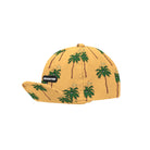 A yellow baseball cap with an all-over green palm tree pattern, featuring a black 'HEADSTER' brand patch on the side and a matching patch on the brim, shown against a plain white background.