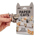 Pakkaged of paper cats with a hand holding one, on a white background