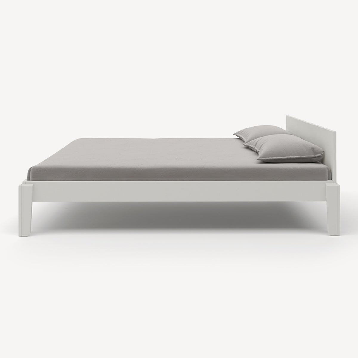 White bed frame with gray bedding on a white background