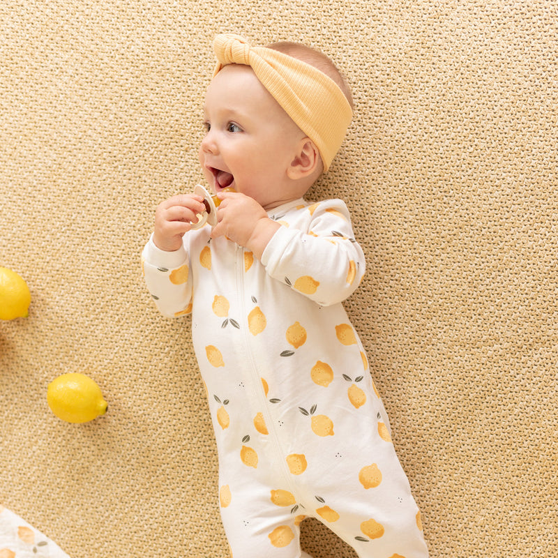 Footed Sleeper - Lemon Print by Petit Lem