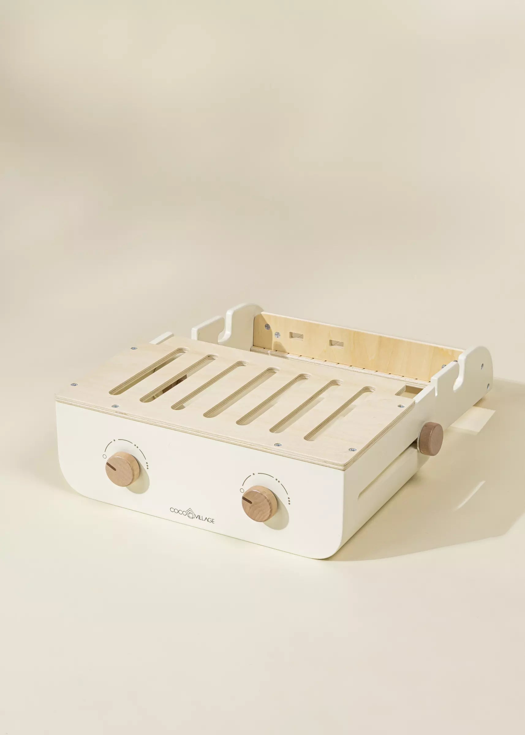 Wooden tray with white base on a beige background