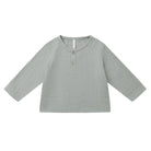 Light green long-sleeve shirt on a white background