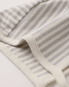 Detail view of the light gray and white fog stripe waffle knit fabric and trim on the Quincy Mae Take Home Set.