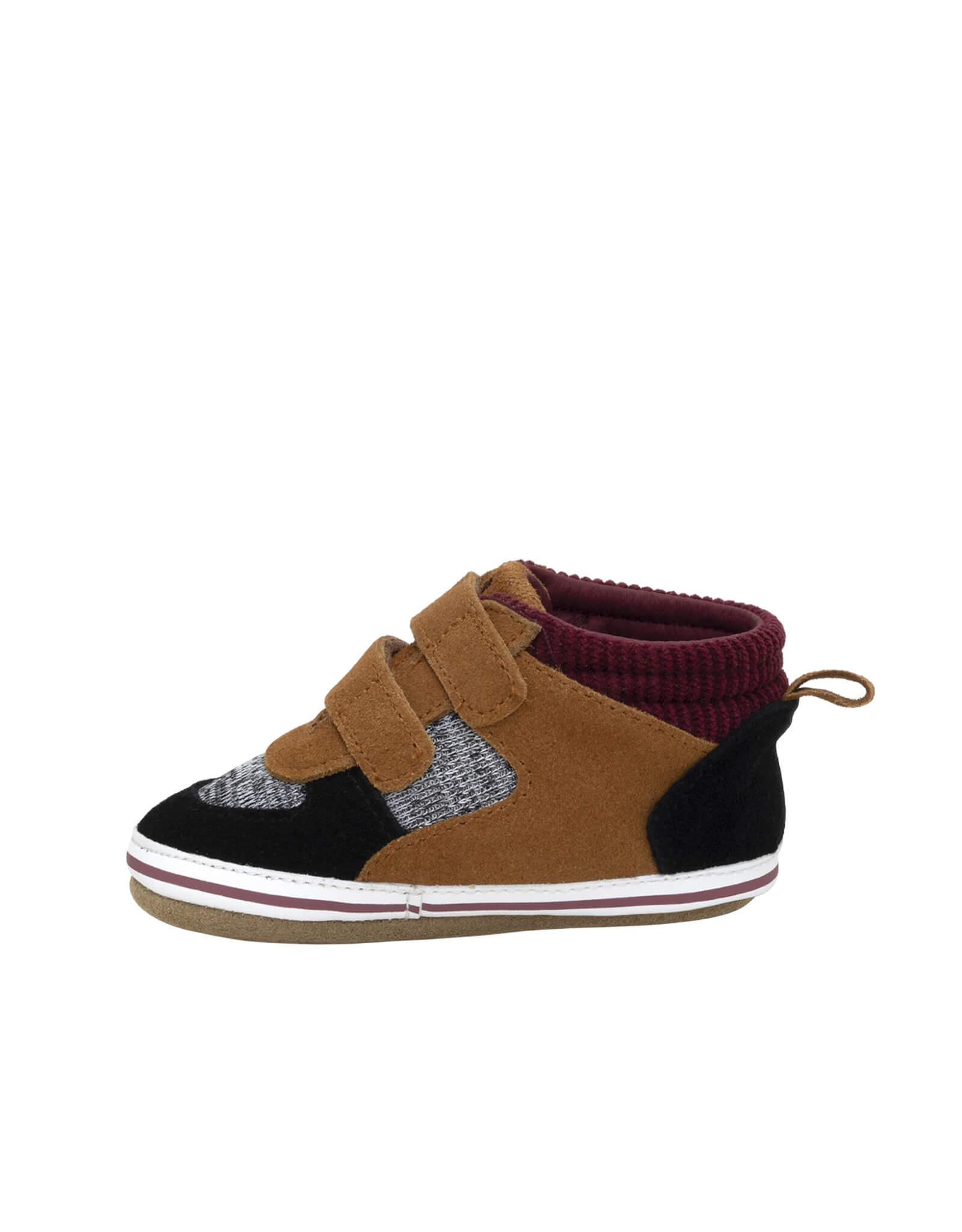 Children's shoe with brown velcro strap on a white background