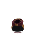 Brown shoe with a maroon sole on a white background