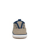 Beige and blue shoe on a white background