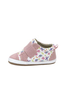 Pink baby shoe with floral pattern on a white background
