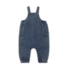A baby's blue denim overall romper with adjustable shoulder straps and front patch pockets, shown flat on a white background.