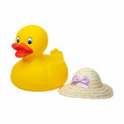 Yellow rubber duck with a straw hat featuring a pink bow on a white background