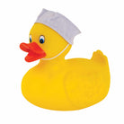 Yellow rubber duck with a white cap on a white background