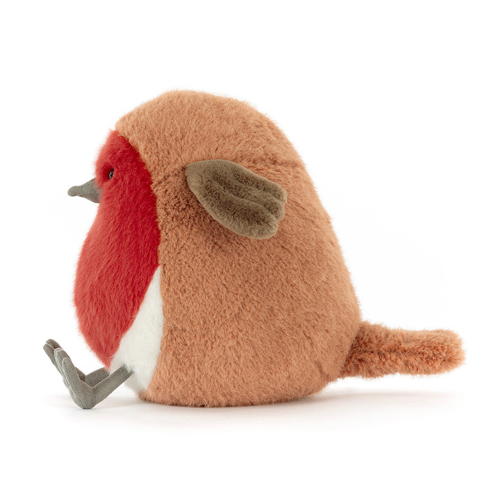 Plush toy robin with a red breast on a white background