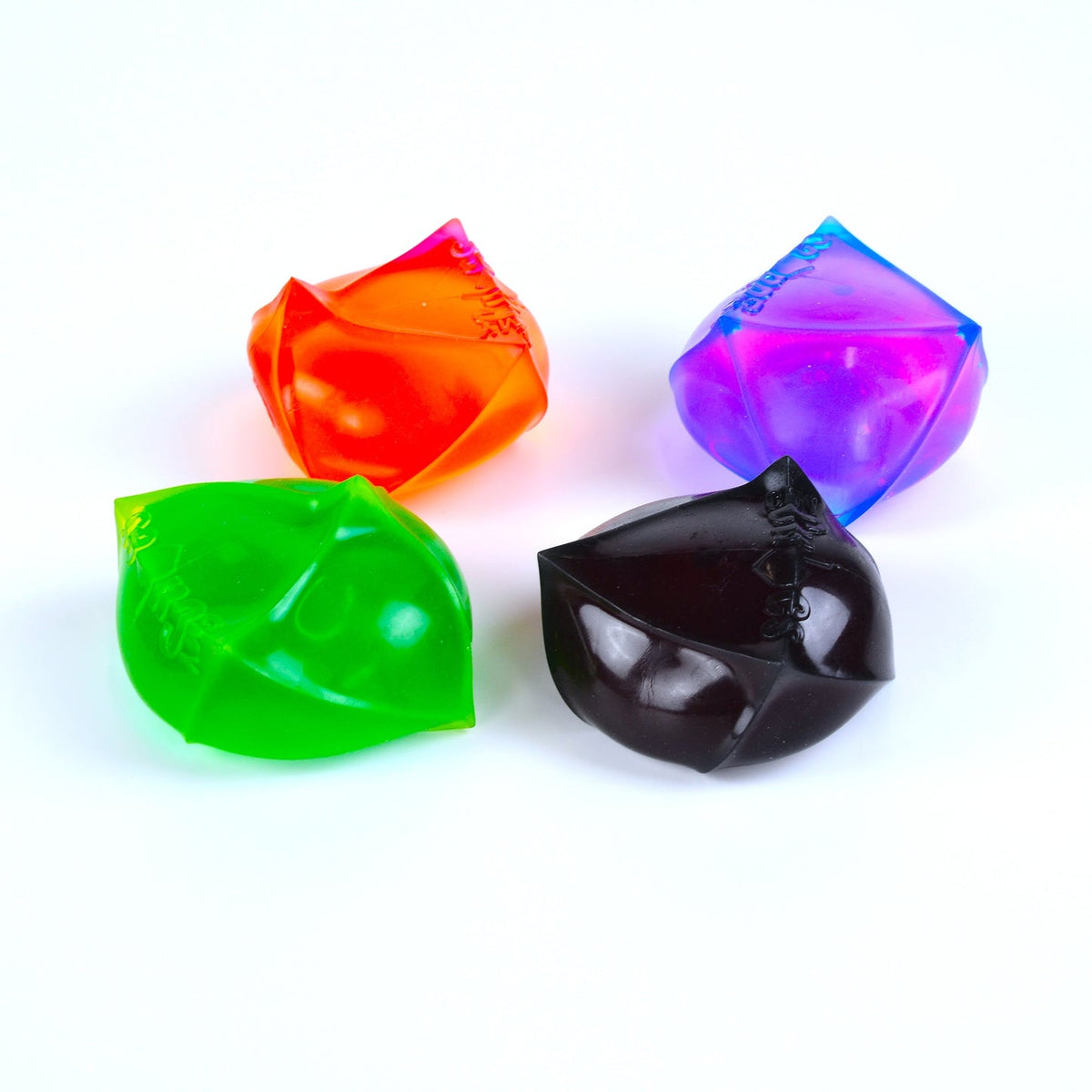 Four colorful dice on a white background