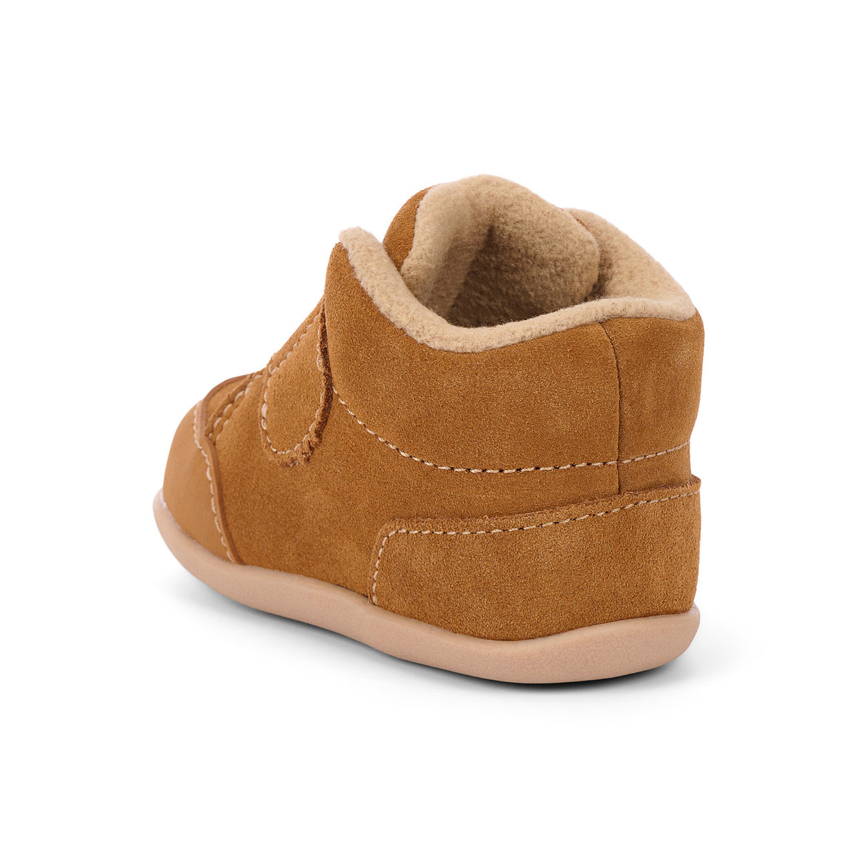 A single toddler bootie in tan suede with a soft beige fleece lining, shown from a rear three-quarter angle on a white background.