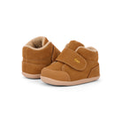 A pair of toddler high-top shoes in tan suede with a soft beige fleece lining and a hook-and-loop strap closure, shown on a white background.