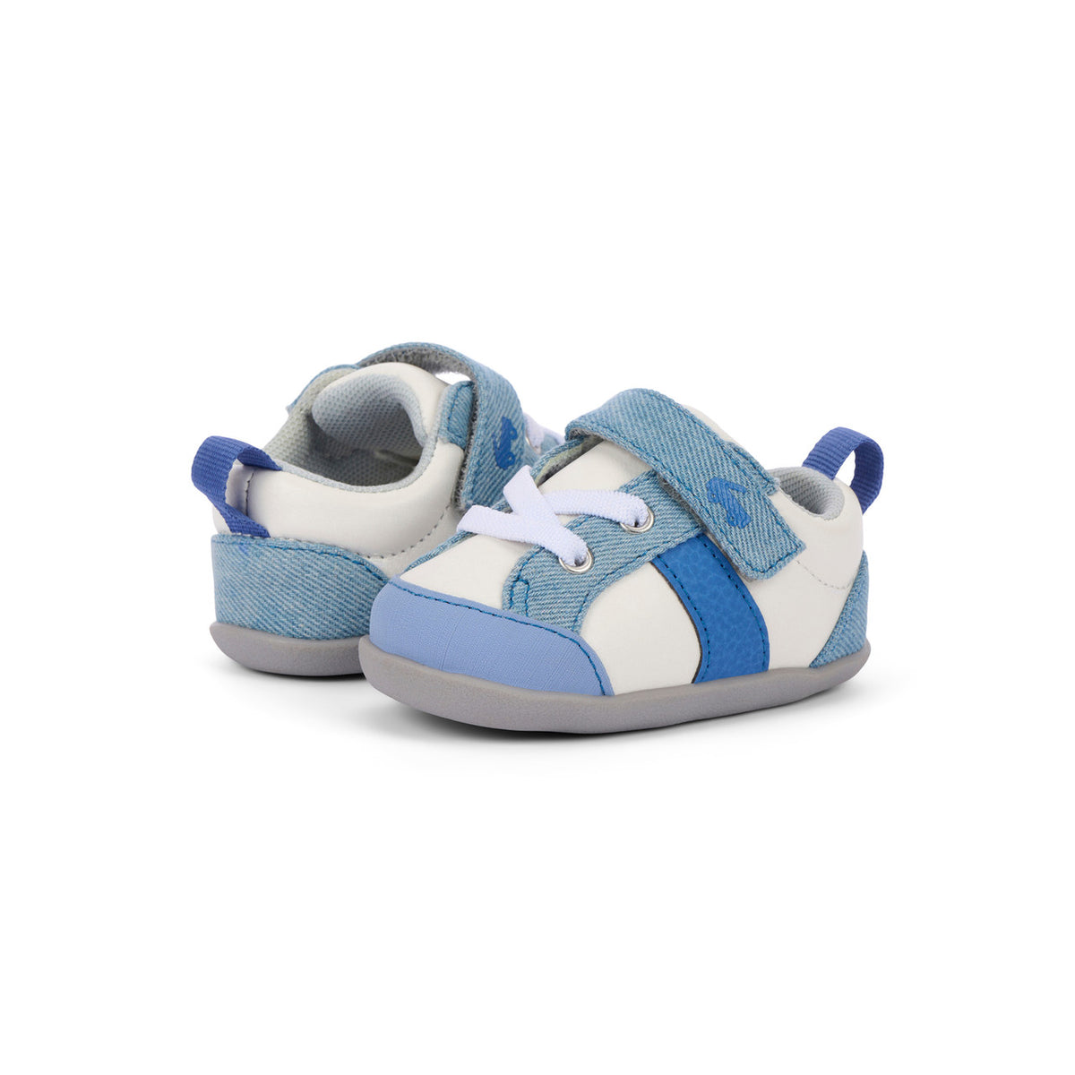 Pair of blue and white baby shoes on a white background