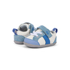 Pair of blue and white baby shoes on a white background