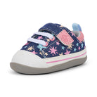 Navy blue children's shoe with star pattern on a white background